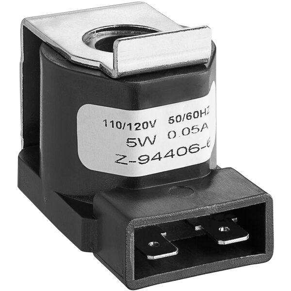A close-up of a black and white Robertshaw gas solenoid valve.