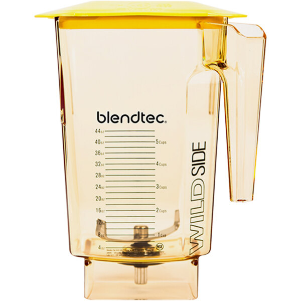 A Blendtec WildSide+ yellow blender jar with yellow hard lid.