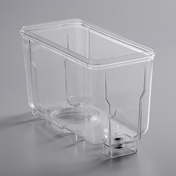 A clear plastic Carnival King 3 gallon bowl with a lid on a counter.
