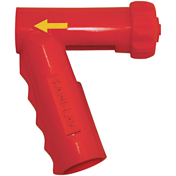 A close up of a red plastic cover for a spray nozzle with a yellow arrow pointing to the side.