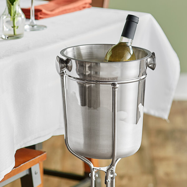 An Acopa wine bottle in a wine bucket on a table of ice.