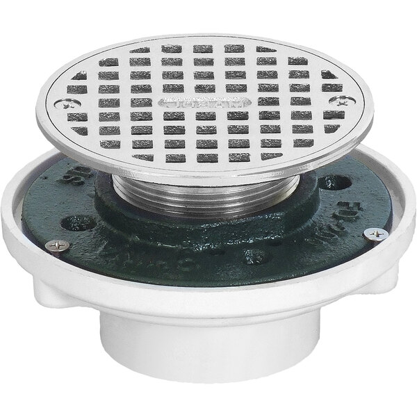 A Josam round PVC floor drain with a chrome-plated brass strainer over a black drain.