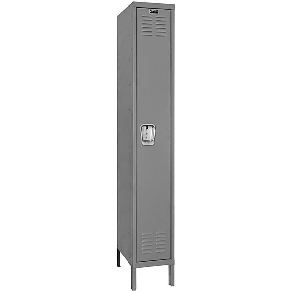 A gray metal Hallowell locker with a recessed silver handle.
