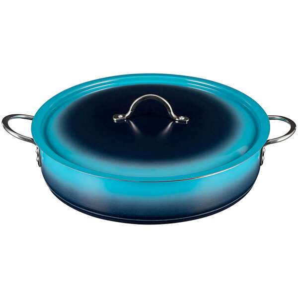 A blue Bon Chef brazier pot with a lid and handle.