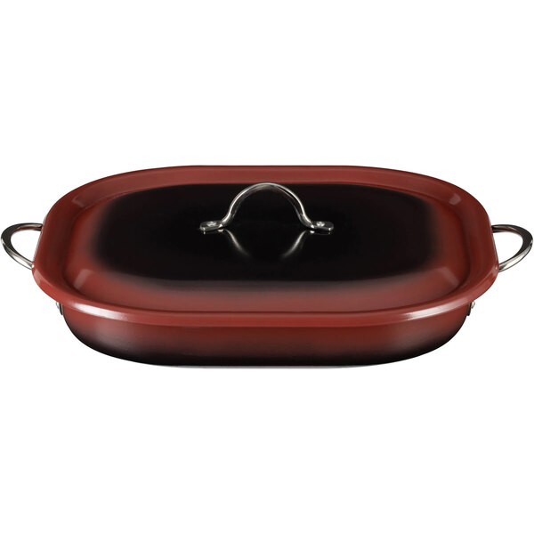 A Bon Chef Country French red and black roasting pan with a lid.