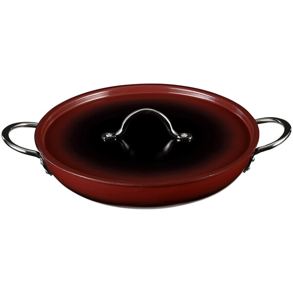 A red Bon Chef Country French saute pan with a handle and lid.