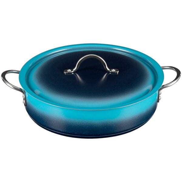 A Bon Chef Ombre Caribbean Blue Braising Pot with Lid and Handle.