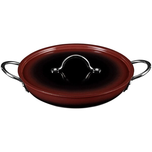 A close-up of a red Bon Chef Country French saute pan with a lid.