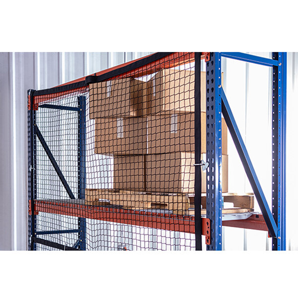 Adrian's Safety Solutions modular pallet rack safety net attached to a large metal pallet rack with boxes on it.
