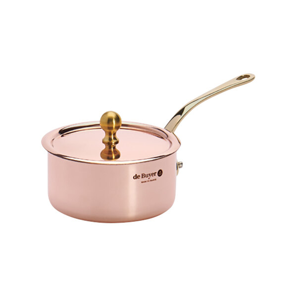 A de Buyer copper saucepan with a lid and handle.