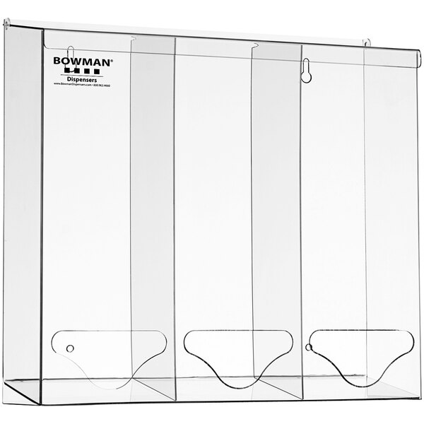A BOWMAN clear plastic dispenser with three compartments.