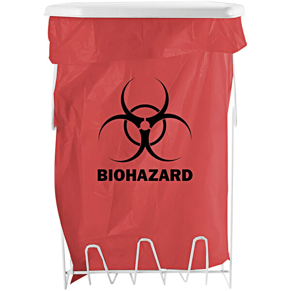 A white coated wire BOWMAN biohazard bag holder with a black biohazard symbol on a red plastic bag.
