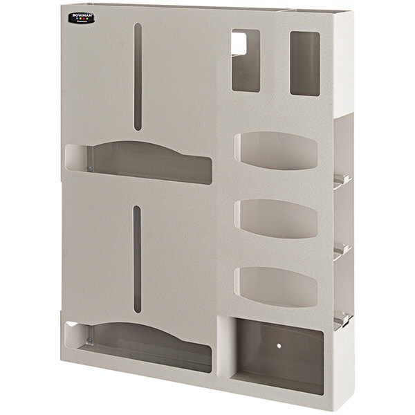 A beige wall mounted triple glove box dispenser with clear plastic covers.