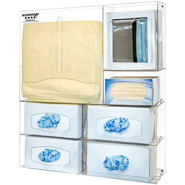 A BOWMAN clear plastic organizer with tissue boxes inside.