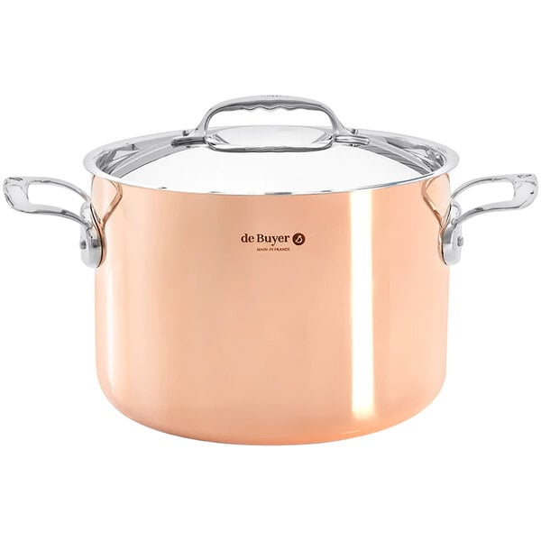 A de Buyer Prima Matera copper sauce pot with a lid and handle.