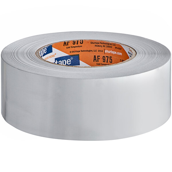 A roll of Shurtape silver aluminum foil tape with white and orange labels.