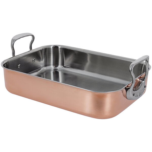 A de Buyer copper roasting pan with handles.