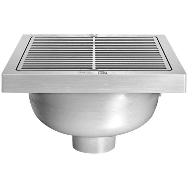 A Zurn stainless steel floor sink frame with a nickel bronze grate over a drain hole.