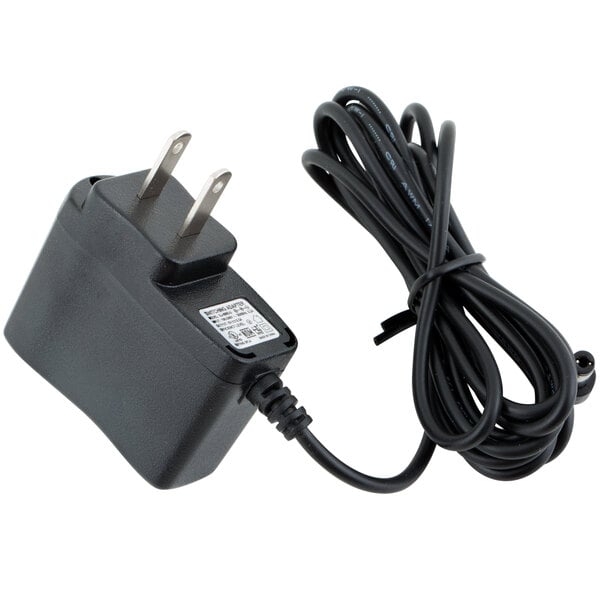 A black Tor Rey 9V AC adapter with two plugs.
