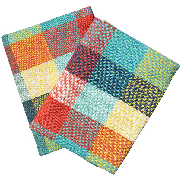 Two colorful plaid Garnier-Thiebaut cloth napkins.