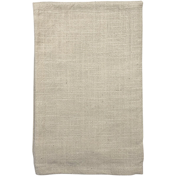 A close up of a beige Garnier-Thiebaut Tadoba cloth napkin with a slub fabric texture.