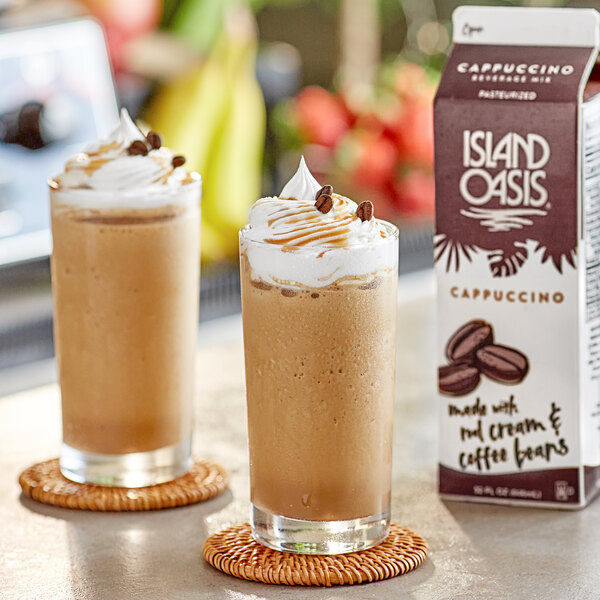 A close up of a box of Island Oasis Cappuccino Frozen Beverage Mix with a white background.