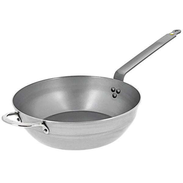A de Buyer carbon steel frying pan with a helper handle.