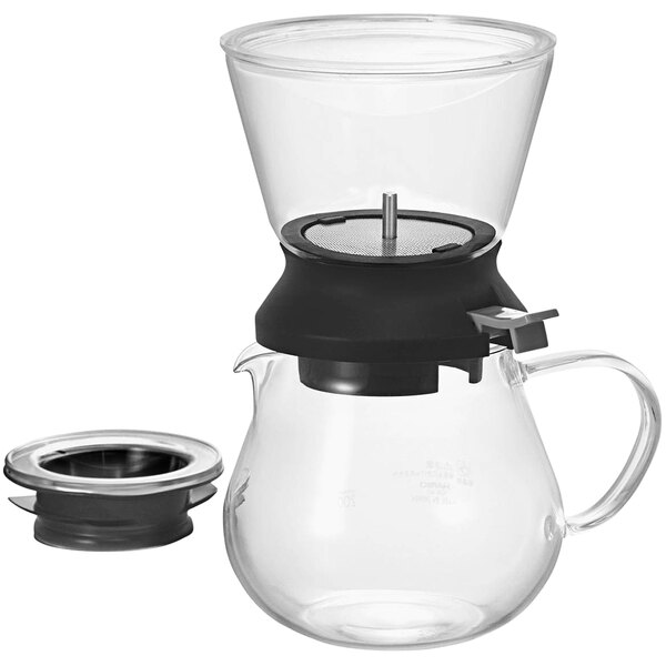 A Hario glass coffee maker with a lid.