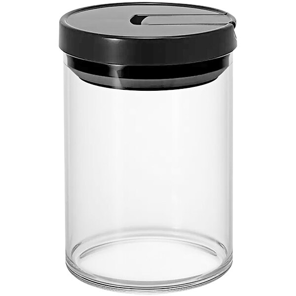 A clear glass Hario canister with a black lid.