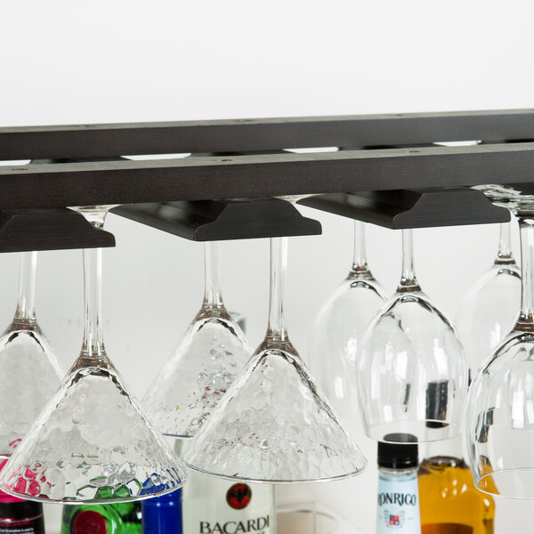 An American Metalcraft espresso bar glass rack holding wine glasses.