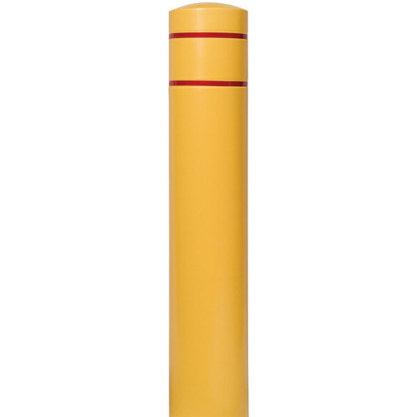A yellow cylindrical object with red stripes.