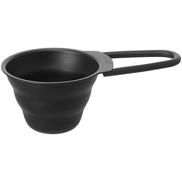 A black stainless steel measuring spoon with a handle.
