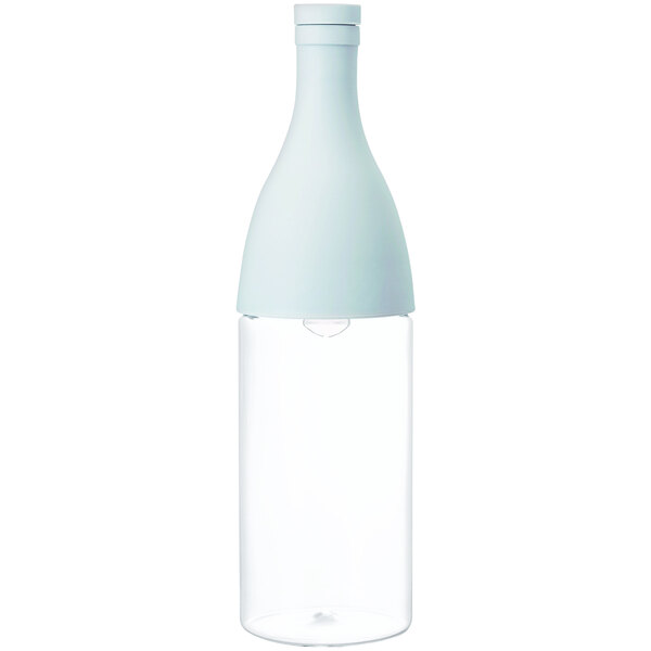 A clear bottle with a white cap.