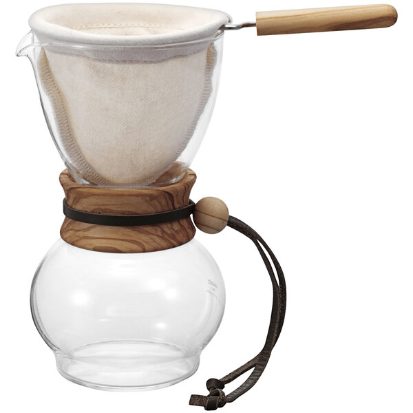 A Hario glass coffee maker with a wooden neck and lid.