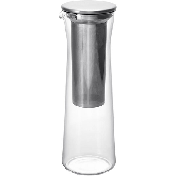 A clear glass container with a silver metal lid.