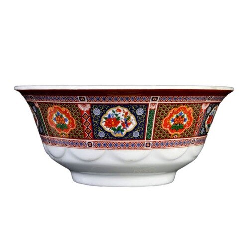 A close-up of a Thunder Group Peacock melamine bowl with colorful designs.
