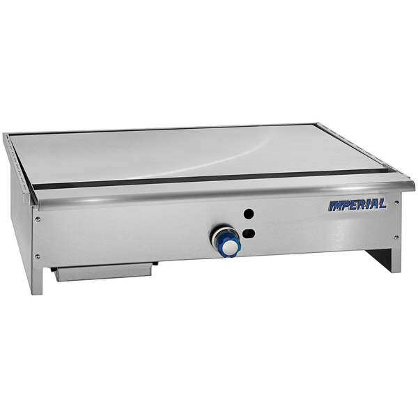 A stainless steel Imperial Range natural gas Teppanyaki griddle with a blue control panel.