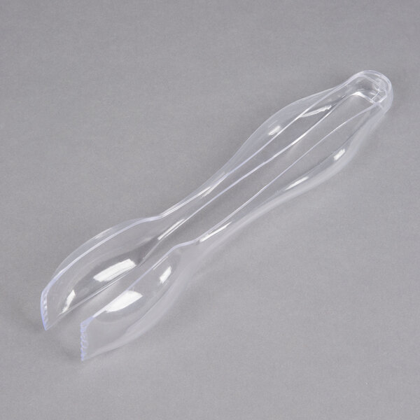 Clear disposable plastic tongs with a handle.
