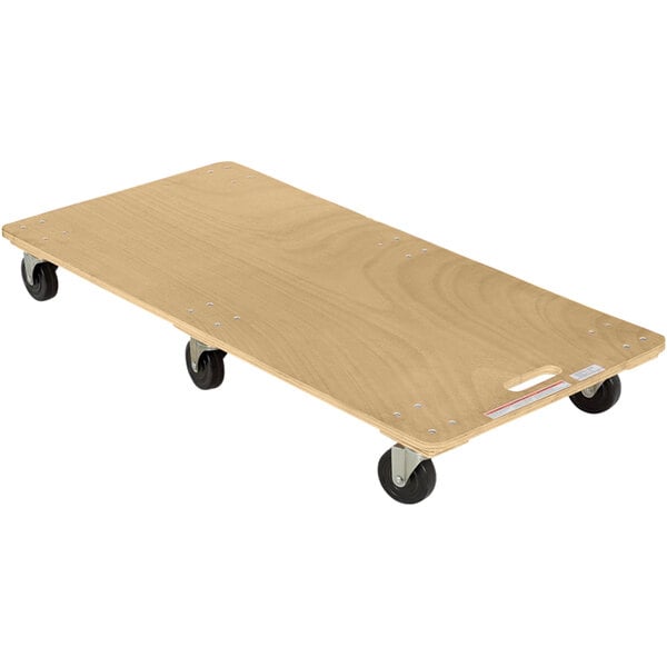 A wooden board with six black wheels.
