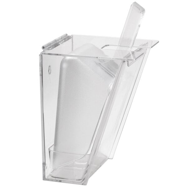 A clear plastic container with a Cal-Mil Wall Mount Scoop Holder and scoop inside.