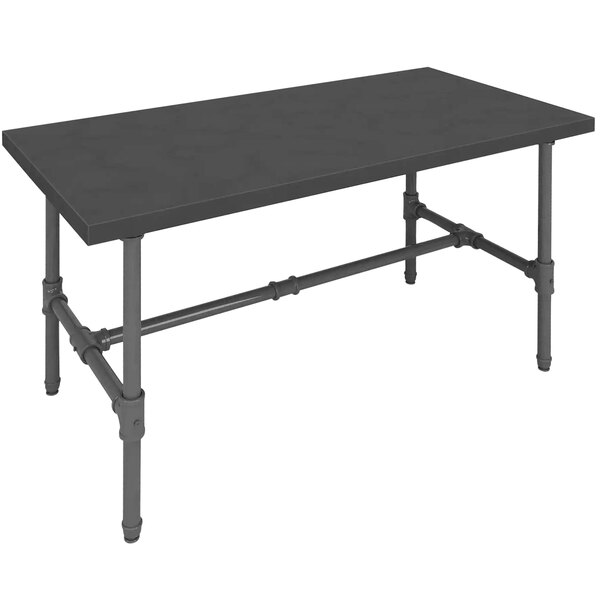 A black rectangular table with pipes on it.
