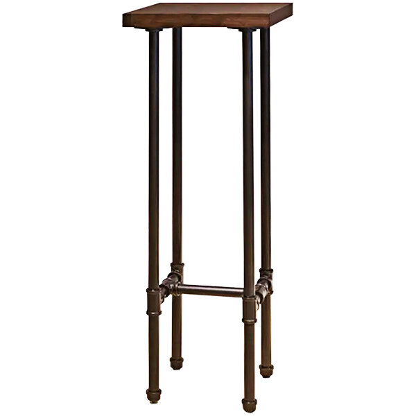 An Econoco wood display table with metal pipe legs.