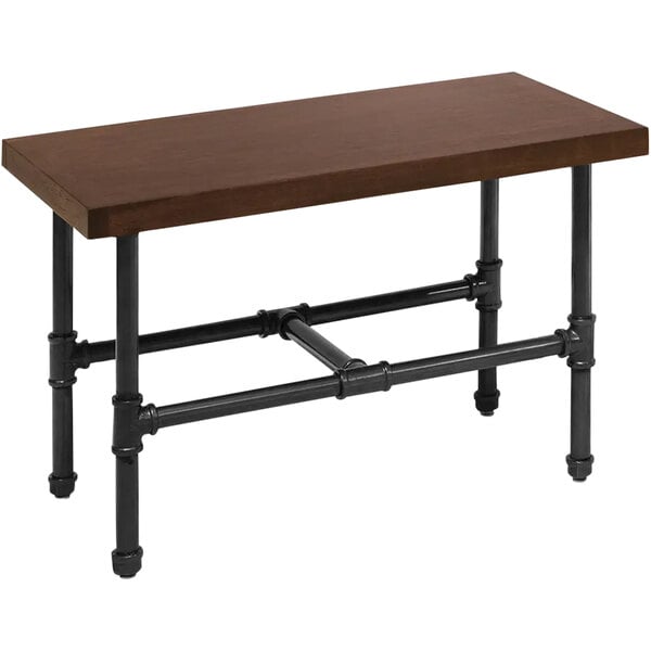 An Econoco industrial-style display table with a dark wood top and black pipe legs.