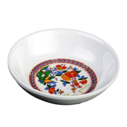 A white bowl with colorful peacock designs.