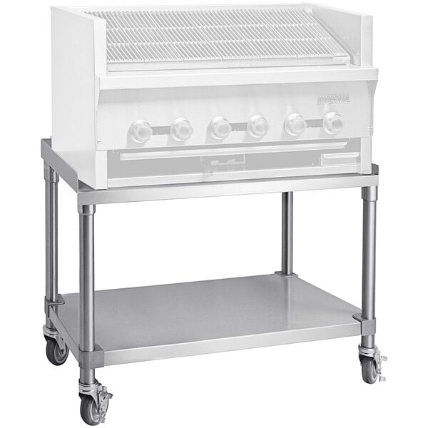 A stainless steel cart with a metal stand for an Imperial Range steakhouse broiler.