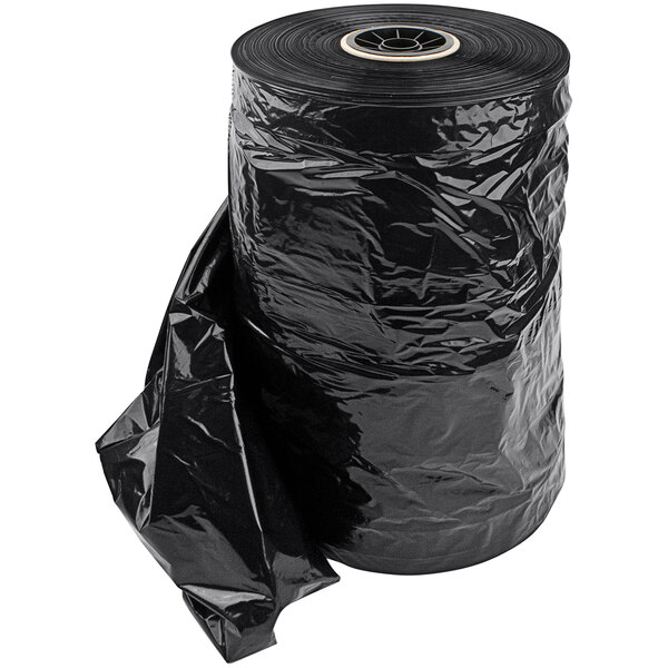 A roll of black plastic garment bags.