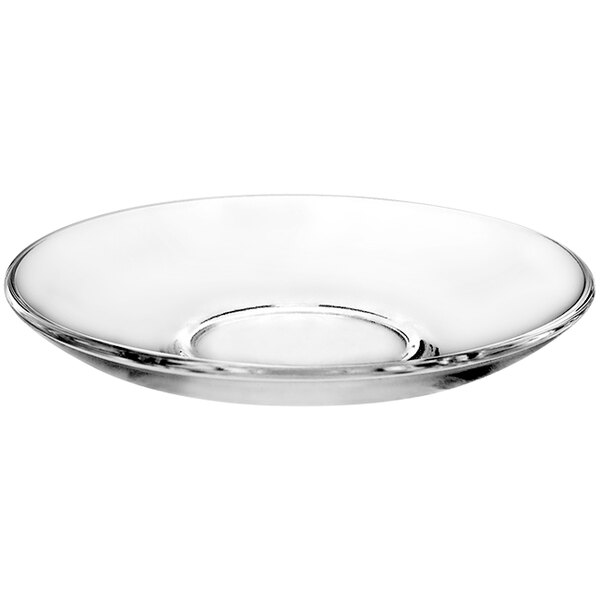 A clear glass saucer with a rim.