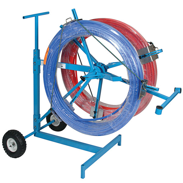 A Zurn PEX Portable Pipe Dispenser with blue and red coils on a cart.