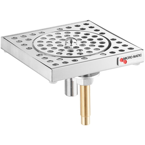 A Micro Matic surface mount glass rinser with a metal square with holes.