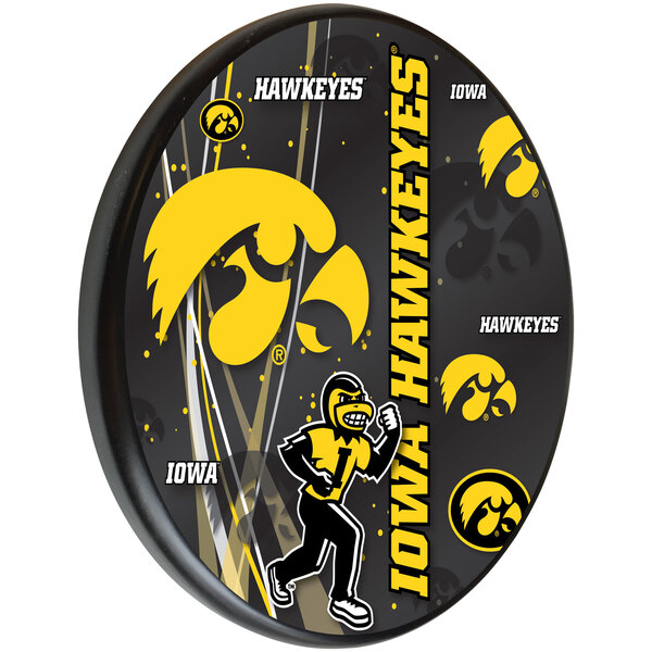 A black wooden sign with a yellow University of Iowa Hawkeyes logo.
